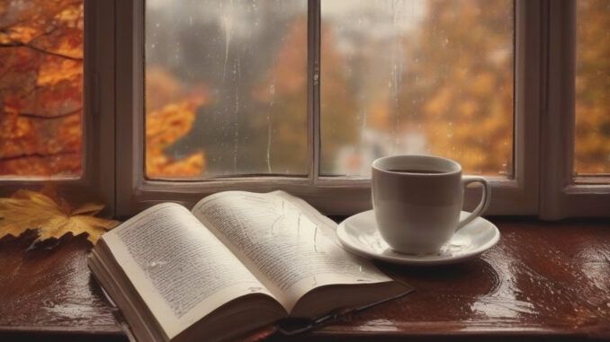 Jesień - grafika ilustracyjna: deszcz na szybie, otwarta książka, filiżanka herbaty